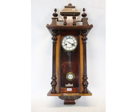 Late 19th century Vienna regulator-style wall clock in walnut case with enamel Roman numeral dial