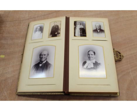 Two Victorian photograph albums with contents CONDITION REPORT Carte de visite album is good quality album void of contents, 
