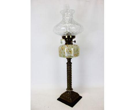 Victorian duplex brass oil lamp with marbled 'end of day glass' reservoir and clear glass shade, approximately 78cm high