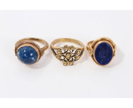 Yellow metal seal ring, one other ring with blue cabochon stone and a silver gilt scroll design ring (3) CONDITION REPORT Vic