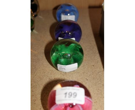 Four Caithness 'Seagems' 1995 glass paperweights, made by Stuart Cummings