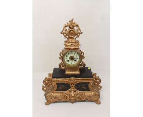 19th century mantel clock with eight day French movement, outside countwheel striking on a bell, white enamel dial with Arabi