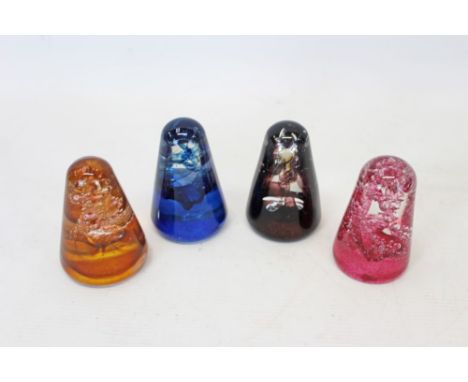 Four Caithness 'Nova' 1981 glass paperweights, by Colin Terris