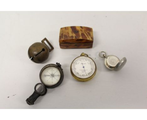 F. Darton &amp; Co. pocket barometer, tinplate pocket compass with mirror and lenses, sovereign case, brass Crotal bell and a