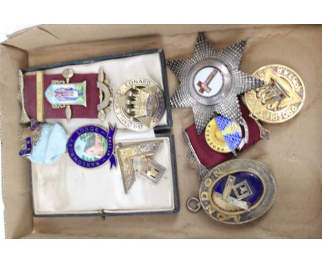 Collection of five silver, silver gilt and enamel Masonic jewels