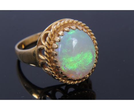 Gold opal single stone ring.  Size O½ CONDITION REPORT Mark is rubbed but believed to be gold (18ct).  Weight approximately 4