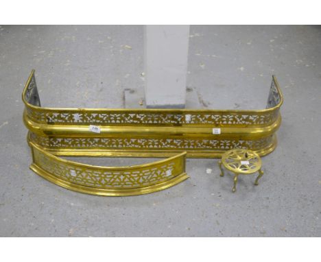Brass fire fender, together with another smaller and a brass trivet