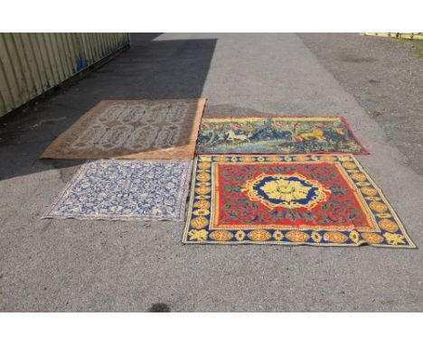 A tapestry with three other carpets