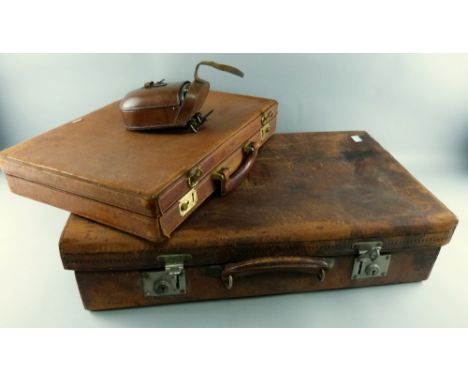 Leather cased hunting set, spirit flask and sandwich box,leather suitcase by Arthur Barber and a leather briefcase