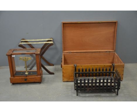Brass balance scales in fitted case, a fire grate with coal, a trunk and luggage stand