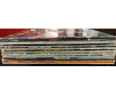 A collection of LPs with artists including John Lennon, Roxy Music, The Stranglers etc. UK P&amp;P Group 3 (£30+VAT for the f