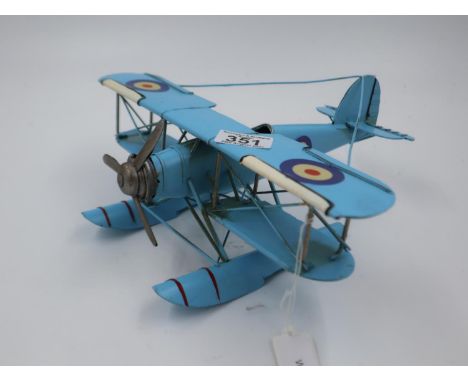 Blue tin plate biplane, wingspan: 32 cm. UK P&amp;P Group 2 (£20+VAT for the first lot and £4+VAT for subsequent lots) 