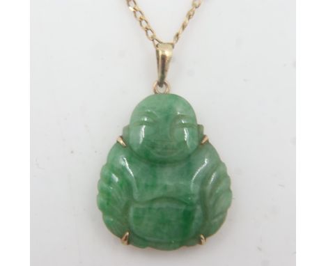 A 9ct gold mounted carved jade pendant in the form of a Buddha, drop L: 25 mm, on a 9ct gold chain, combined 4.1g. UK P&amp;P