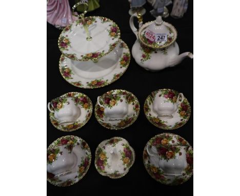 Royal Albert teaware items in the Old Country Roses pattern, including a large teapot, 5 cups, 5 saucers and a 2 tier cakesta