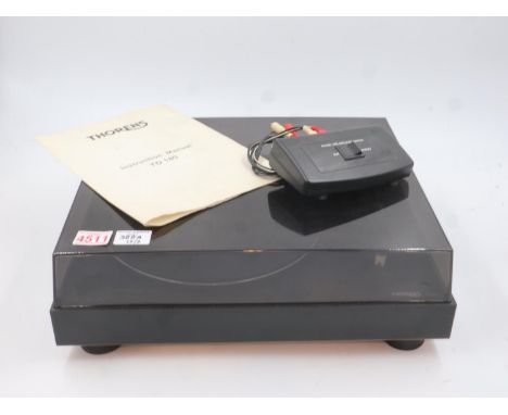 Thorens TD180 turntable with paperwork and cables. All electrical items in this lot have been PAT tested for safety and have 