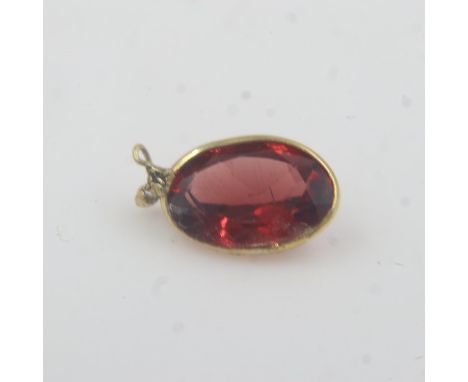 Natural oval cut garnet 9ct gold bezel set charm pendant. UK P&amp;P Group 0 (£6+VAT for the first lot and £1+VAT for subsequ