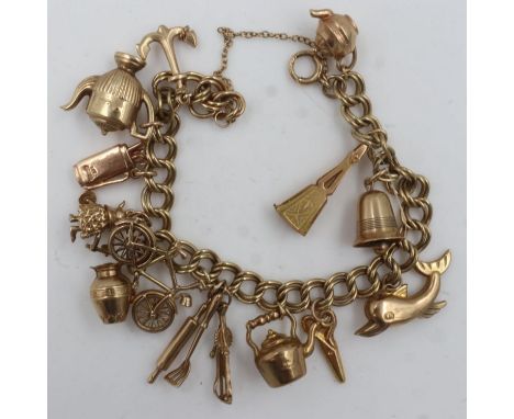 9ct gold charm bracelet with twelve charms including a bicycle charm, 34.4g. UK P&amp;P Group 0 (£6+VAT for the first lot and