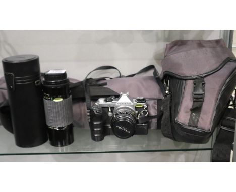 Pentax ME Super camera with Pentax 50mm lens, battery grip, tripod and Sigma Zoon lens with soft cases. UK P&amp;P Group 2 (£