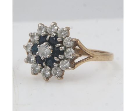 9ct gold sapphire and cubic zirconia set target design cocktail ring, size Q/R, 2.6g. UK P&amp;P Group 1 (£16+VAT for the fir