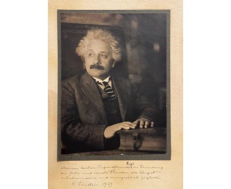 Albert Einstein (Ulm 1879 - Princeton 1955)Beautiful large photographic portrait with autograph dedication signed “A. Einstei