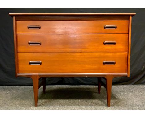 A Younger Furniture, 1960/70s teak chest of drawers, over-sailing rounded rectangular top, three graduated long drawers, tape