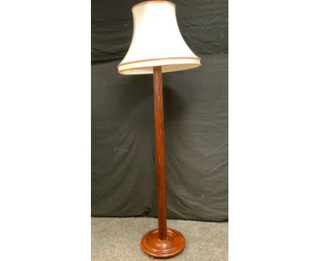 An Early 20th century mahogany Standard Lamp, turned and reeded column, dished base, 149cm tall (176cm with shade). 