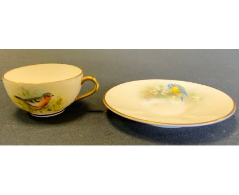 A Royal Worcester cabinet cup and saucer, painted with a chaffinch, signed, printed crown and circle mark 