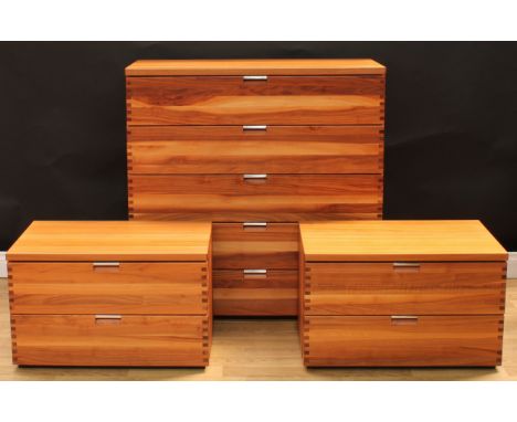 A suite of three contemporary figured and flat sawn black walnut and veneer chests, comprising a chest of five long drawers, 