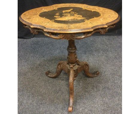 A 19th century Swiss shaped oval occasional table, carved frieze column and tripod base. 72cm high, 66cm long, 47cm wide. 