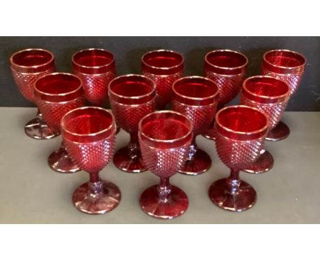 A set of twelve 20th century ruby moulded glass goblet's.(12) 