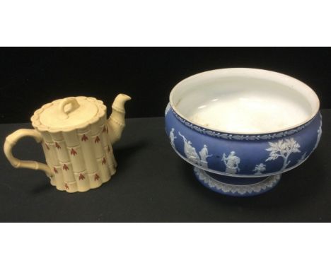 A Wedgwood yellow bamboo ware teapot, impressed marks;  a pale blue jasperware footed bowl (2) 