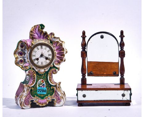 A VICTORIAN CERAMIC MANTEL CLOCK WITH SCROLLING DECORATION (2)And a late 19th century miniature walnut dressing table mirror