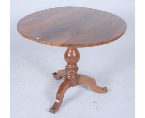 A MODERN CONTINENTAL WALNUT TRIPOD TABLETuned column on three outswept supports 89cm diameter; 68cm high