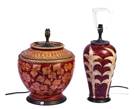 A 20TH CENTURY LARGE ORANGE TABLE LAMP WITH LEAF DECORATION (2)Together with another similar smallerLamps have not been teste