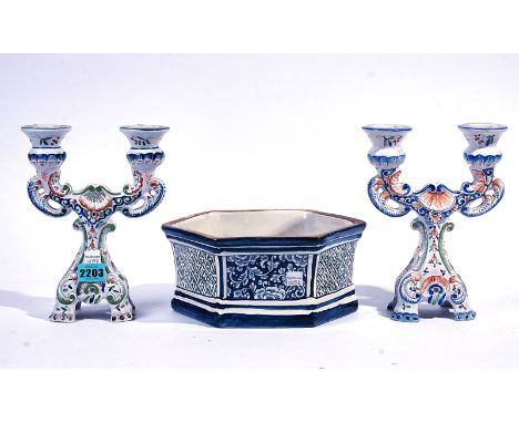 CERAMICS, A PAIR OF DUTCH STYLE TWIN BRANCH CANDELABRA (3)And a delft style octagonal bowl.