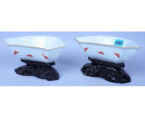 ASIAN CERAMICS; A PAIR OF EARLY 20TH CENTURY CERAMIC SERVING BOWLS ON NATURALISTIC HARDWOOD BASES (2)20cm wide; 11cm highSome
