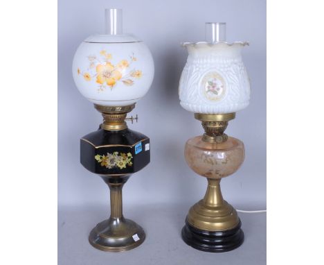 A LATE VICTORIAN GLASS OIL LAMP AND ANOTHER SIMILAR LATER (2)The largest 64cm highCondition: These are in god usable conditio