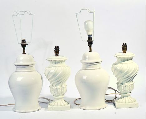A PAIR OF 20TH CENTURY WHITE GLAZED CERAMIC LAMPS OF VASE FORM (4)Together with another pair white glaze ceramic lampsLamps h