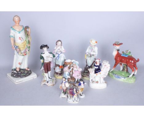 A GROUP OF TEN CERAMIC FIGURINES TO INCLUDE SOME STAFFORDSHIRE FIGURES (10)The largest 31cm high
