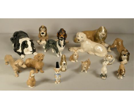 A collection of seventeen various sized mid 20th Century ceramic animal models of dogs, by Studio Szeiler Ltd.TO BE SOLD ON B