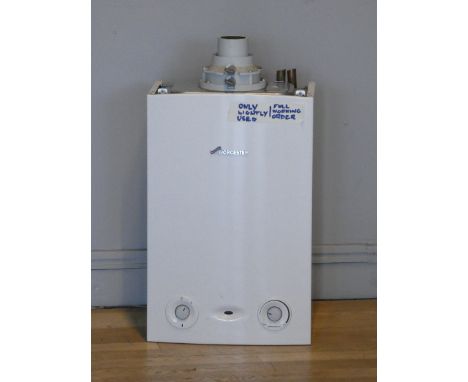 A Worcester Greenstar Ri gas fired condensing boiler (wall hung) complete with filter, installation instructions and user man