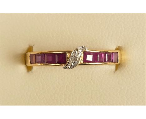 A 9ct gold ruby and diamond dress ring, M, 1.5gm 