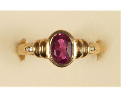 A 9ct gold synthetic ruby and diamond ring, M, 2.2gm 