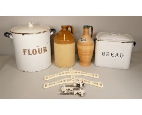 An early 20th Century white enamel flour bin together with a white enamel bread bin, a large Doulton Lambert stoneware flagon