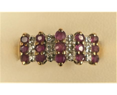 A 9ct gold ruby and diamond dress ring, M 1/2, 2.1gm 