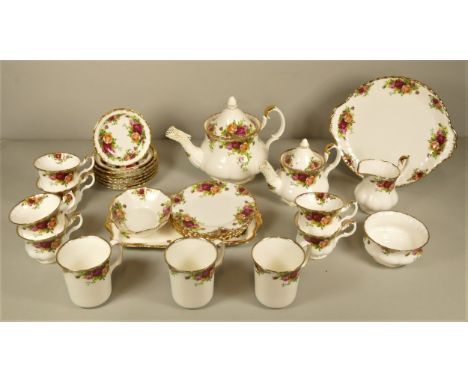 A thirty piece Royal Albert tea service 'Country Roses', comprising of six cups &amp; saucers, six side plates, sugar &amp; m