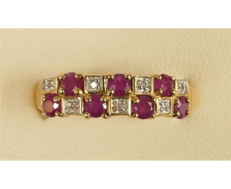 A 9ct gold ruby and diamond ring, P, 2.3gm 