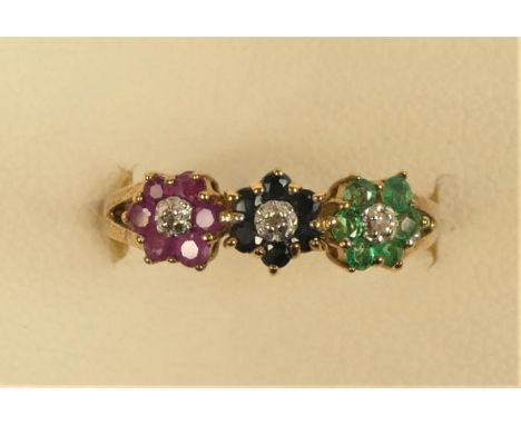 A 9ct gold ruby, sapphire, emerald and diamond triple cluster ring, M, 1.6gm 