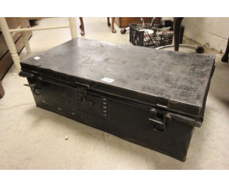 A Victorian tin trunk containing vintage tools