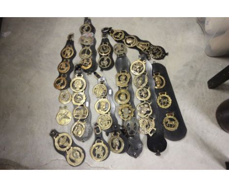Box of vintage Horse brasses with leather hangers